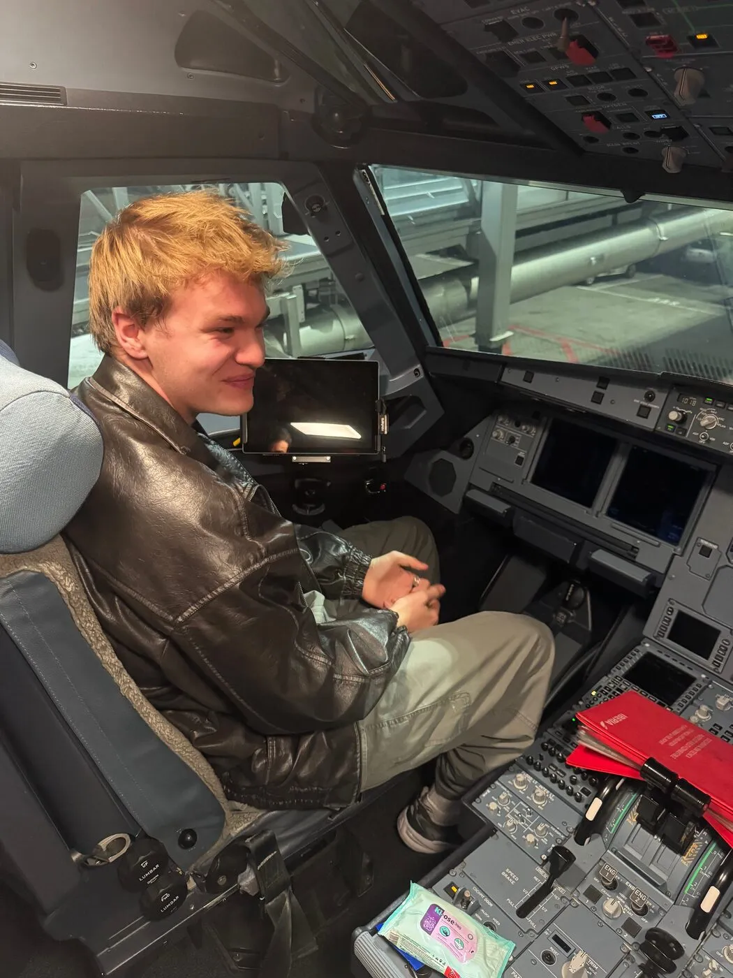 Sitting in the cockpit of an airliner.